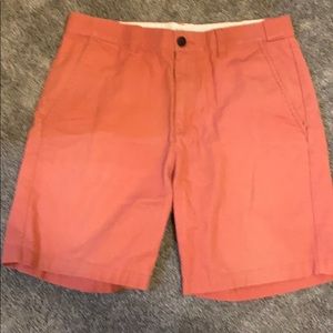 Salmon colored flat front shorts